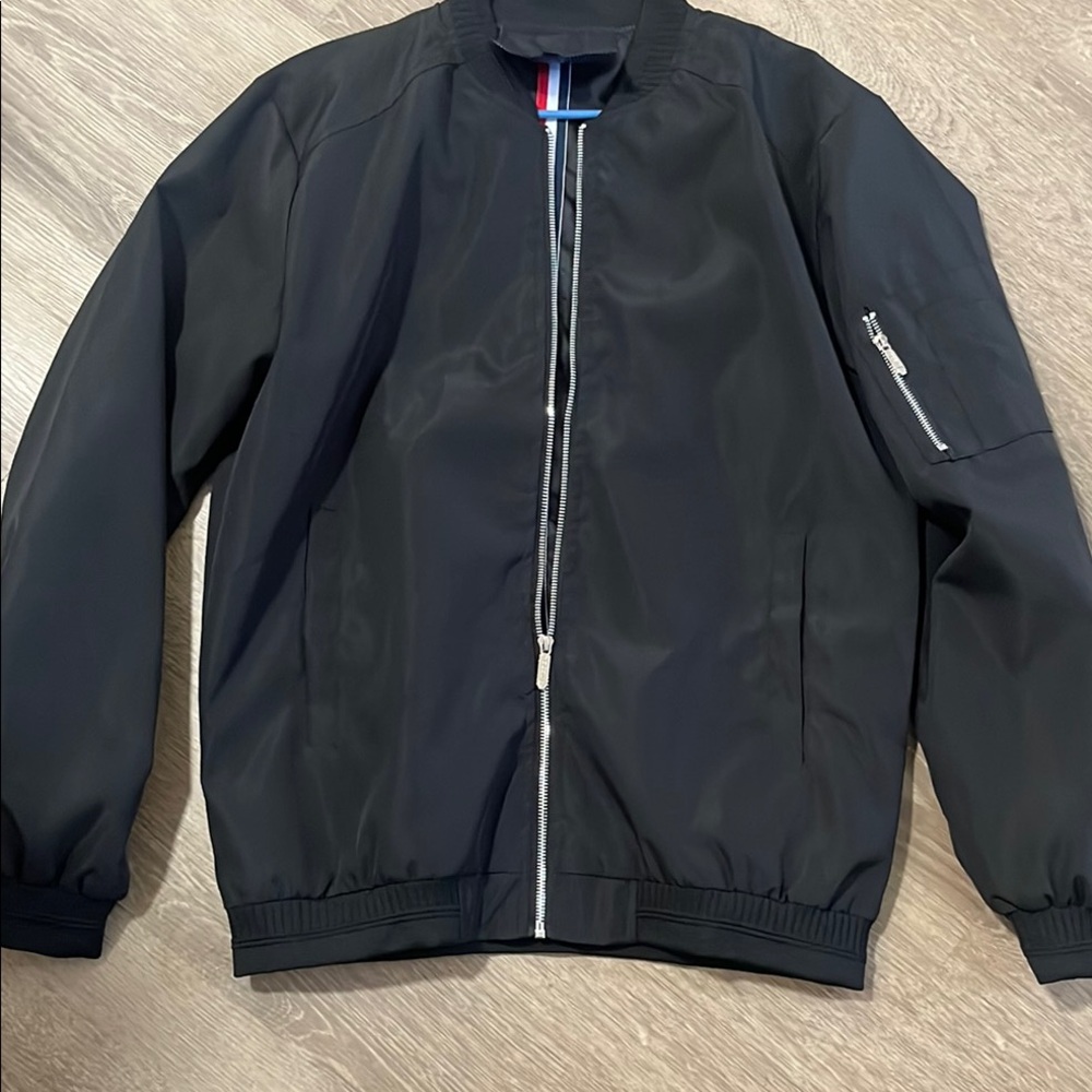 Black Bomber Jacket with Ribbed Trim and Minimalist Design New No Tags